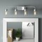 Designers Fountain Logan 32in 4-Light Chrome Transitional Indoor Vanity Light with Clear Seedy Glass Shades 96404-CH - alternate 2